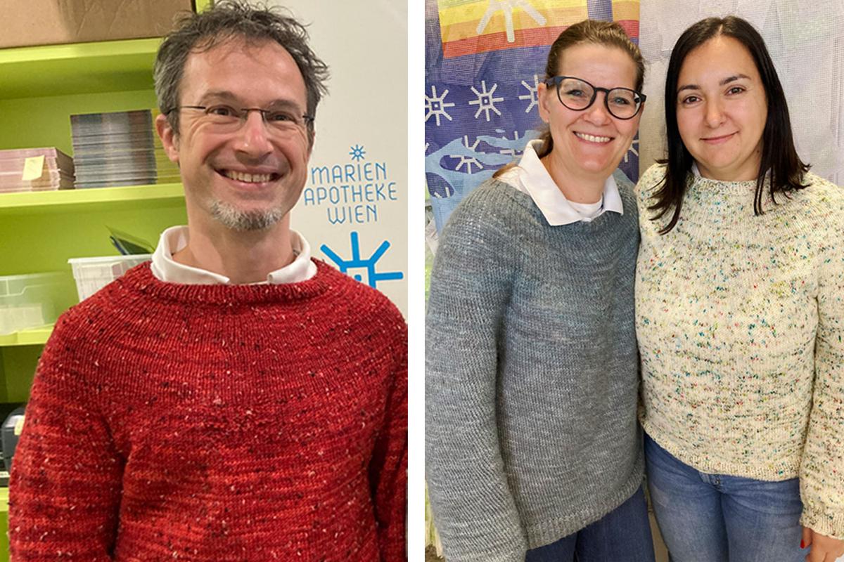 Mitarbeiter*innen der Marien Apotheke in gestrickten Wollpullovern