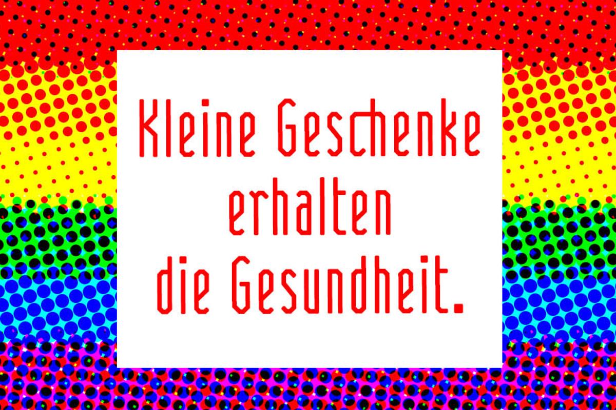 Kleine Geschenke erhalten die Gesundheit als Spruch auf Regenbogen-Farben-Hintergrund