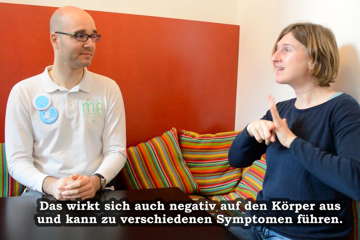 Titelbild ÖGS-Video zu Stress bei Gehörlosen als Teil der psychischen Gesundheit mit Mag. Sreco Dolanc und Mag. Stephanie Häfele- Hausmann