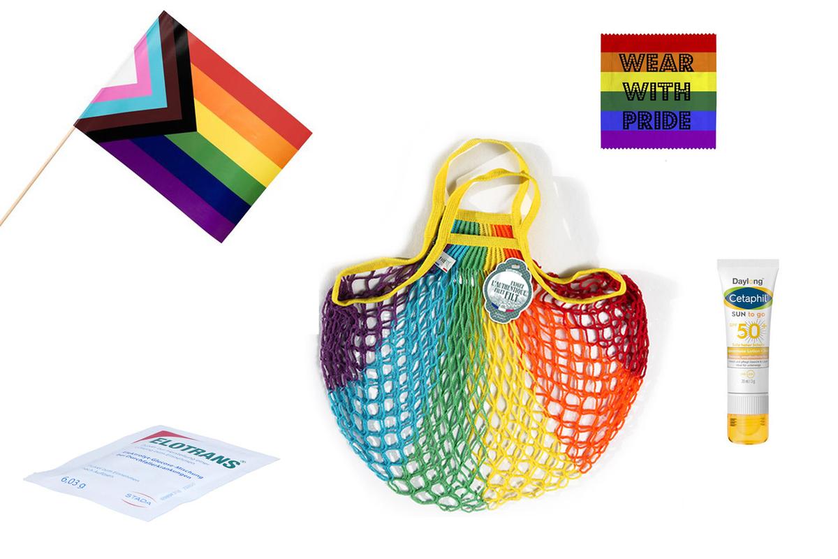 Collage der Pride Goodie Bag der Marien Apotheke Wien. Das Bild enthält eine Regenbogenfahne, eine Netztasche in Regenbogenfarben, eine Sonnencreme, Elektrolytlösung und ein Kondom mit der Aufschrift "Wear with Pride"