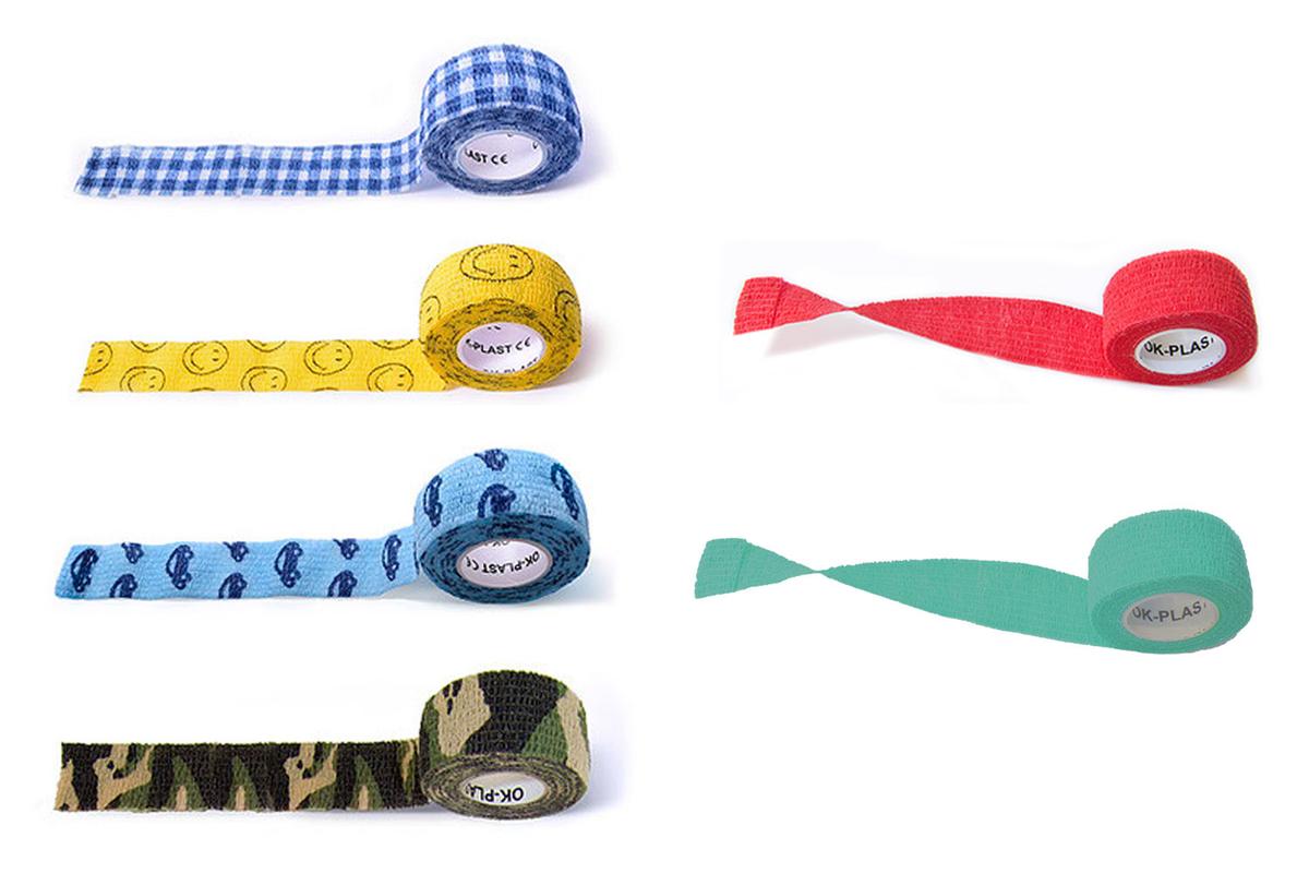 Selbsthaftendes Pflaster von OK-Plast in den Farben rot, blau, türkis, gelb und Camouflage